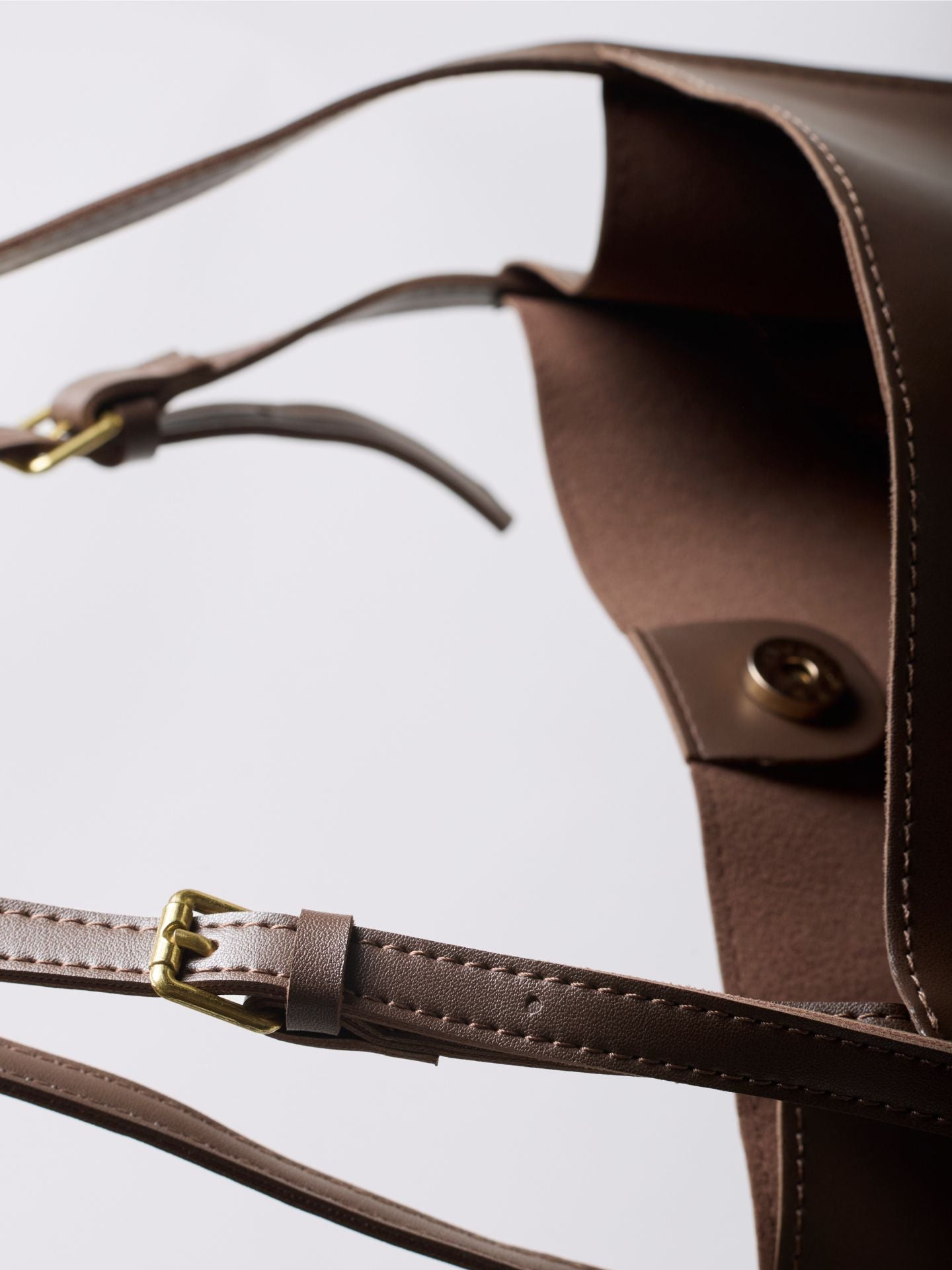 Black Leather Shoulder Bag with Adjustable Strap and Gold Hardware