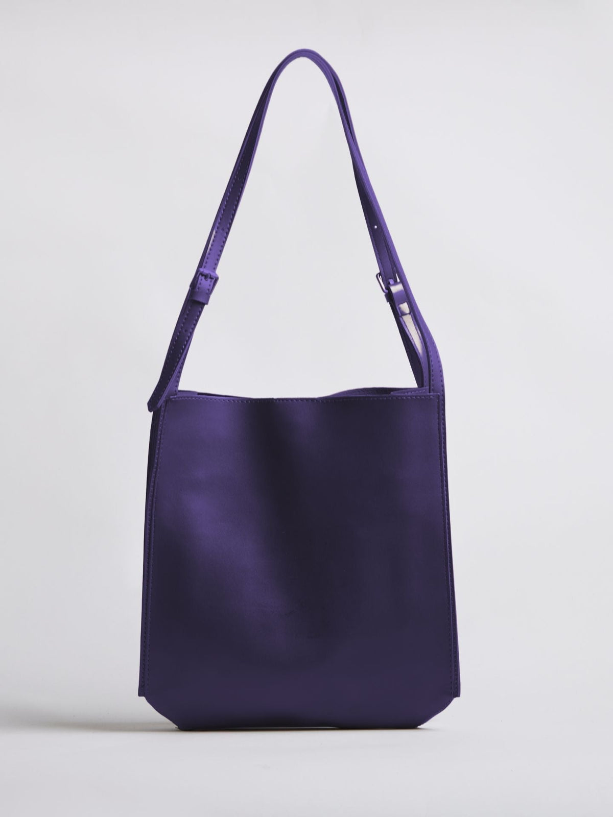 Black Leather Shoulder Bag with Adjustable Strap and Gold Hardware