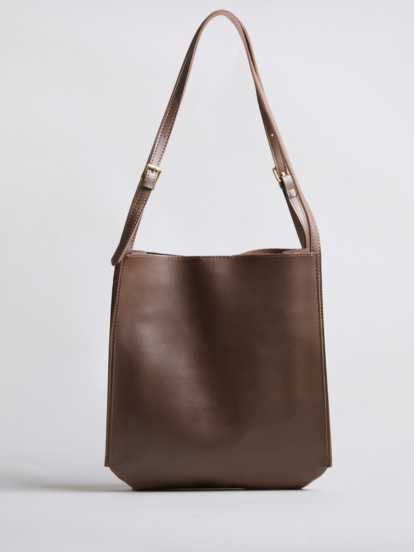 Black Leather Shoulder Bag with Adjustable Strap and Gold Hardware