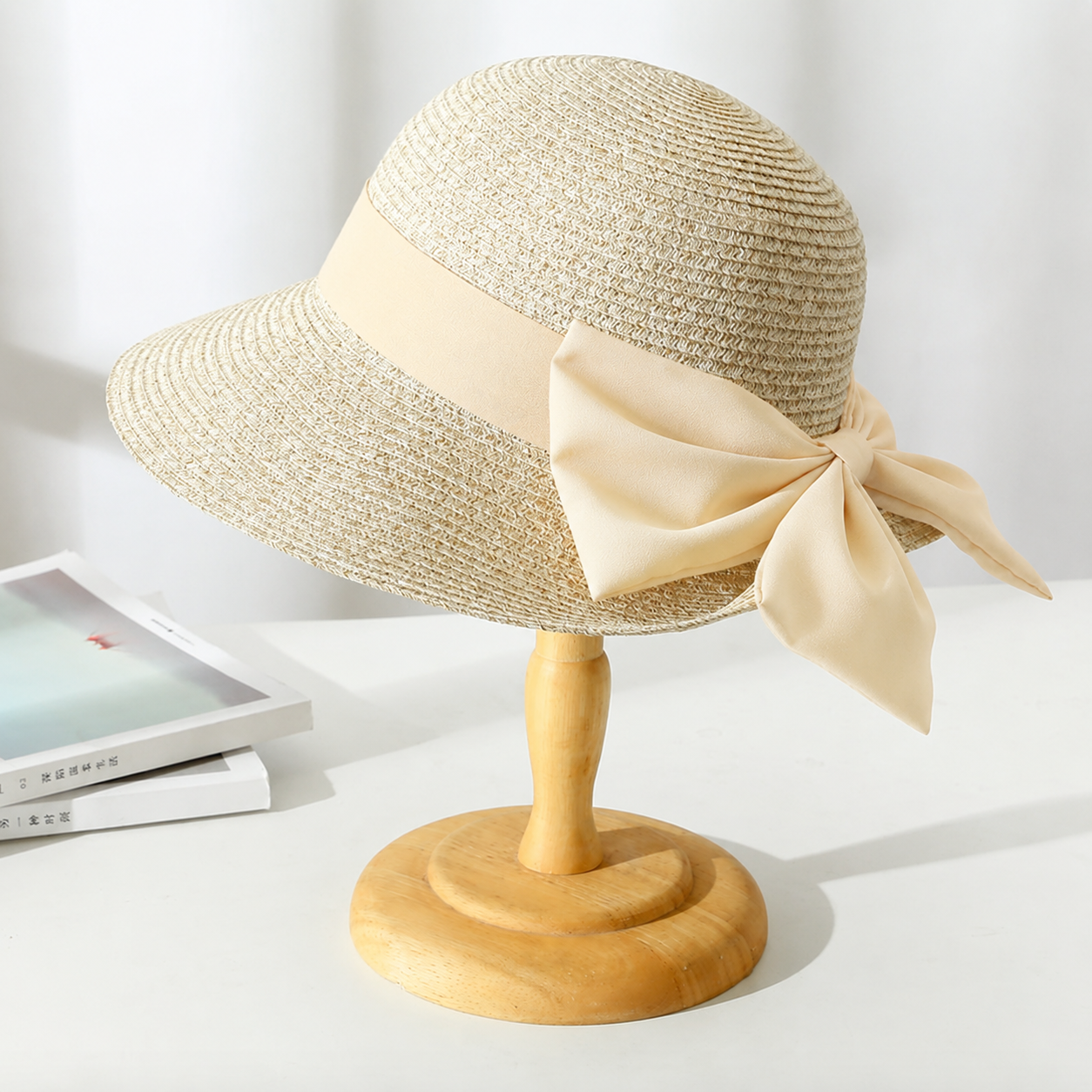 Elegant Straw Sun Hat with Bow Detail
