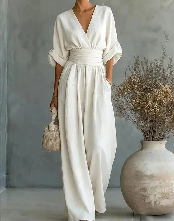Elegant Wide Leg Jumpsuit with Wrap V-Neckline and Sash Waist