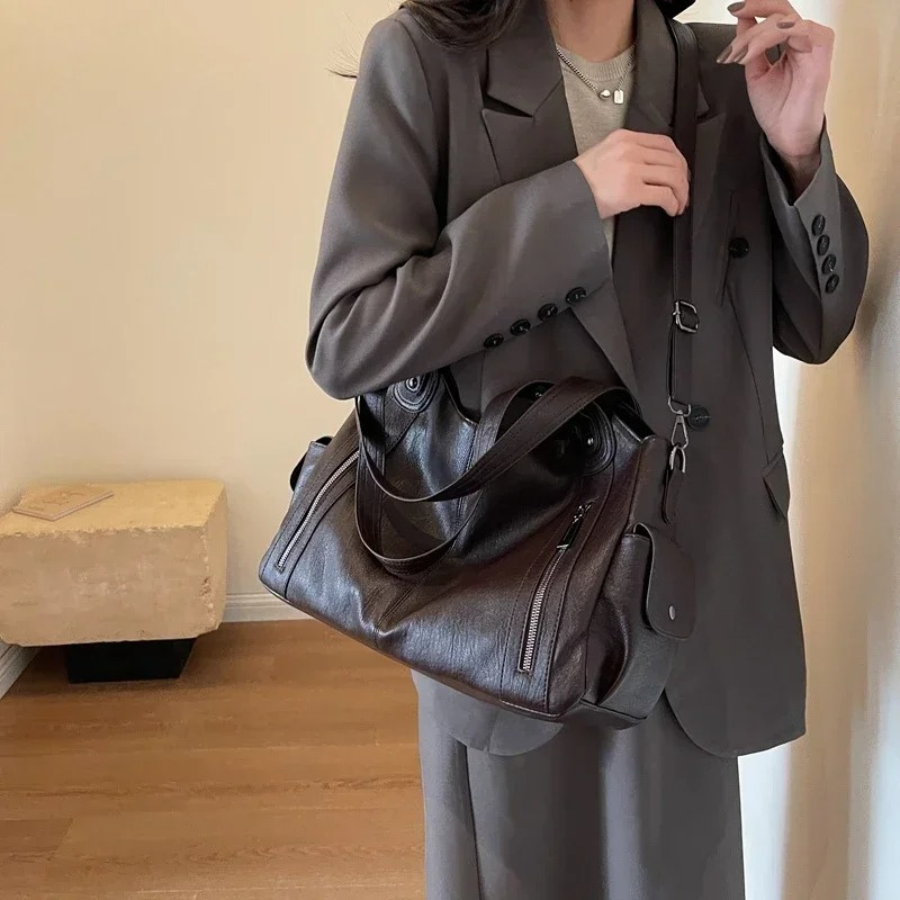 Leather Shoulder Bag with Side Zip Pockets and Stud Handles