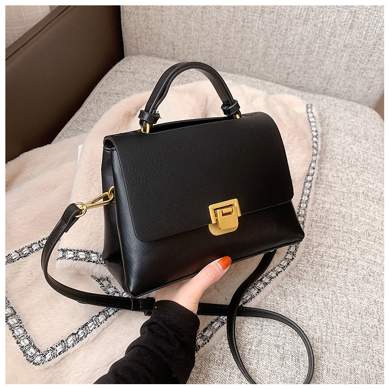 Structured Leather Top Handle Bag with Gold Push-Lock Clasp