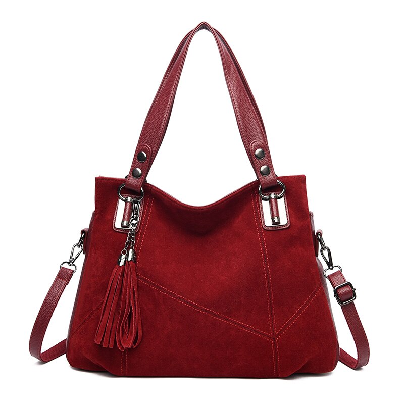 Suede Shoulder Bag with Panel Stitching and Tassel Detail